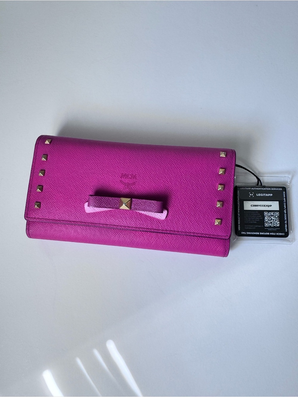 MCM Stud-Trim Bow Clutch Wallet in Fuchsia